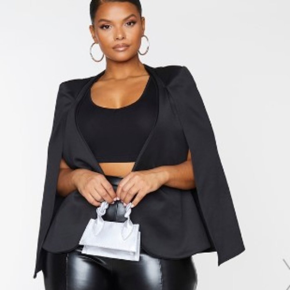 Forever 21 hodden sleeveless dress jacket.